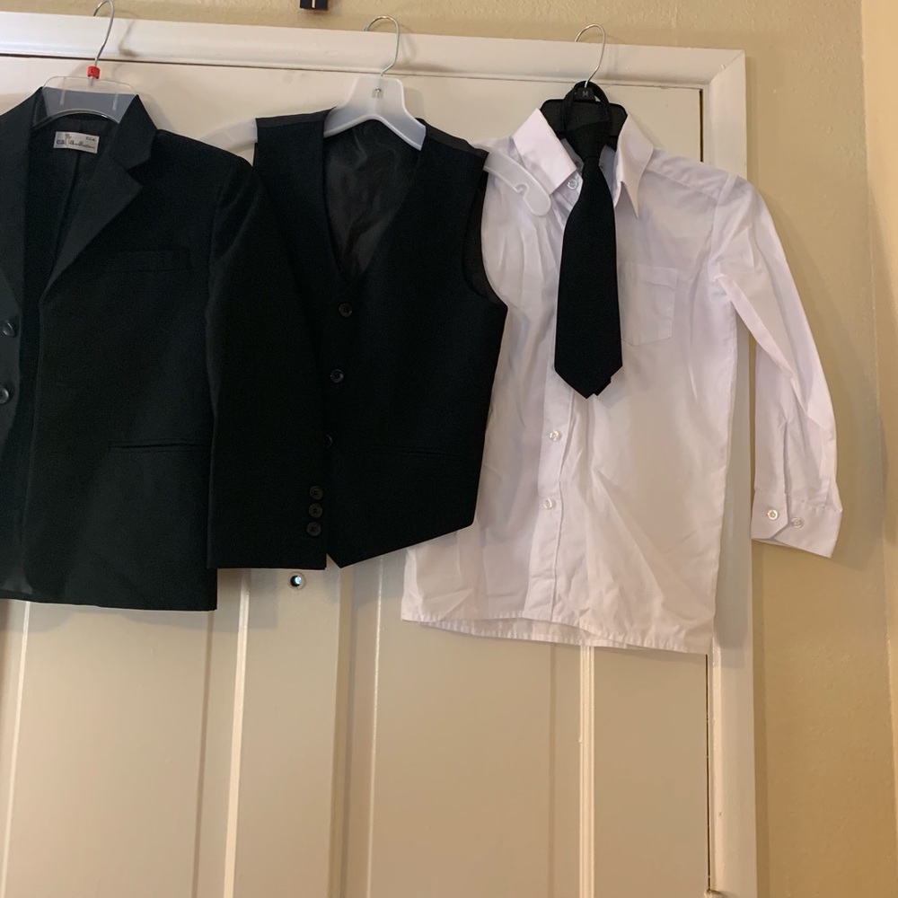Suit, pant, shirt, tie, and vest
